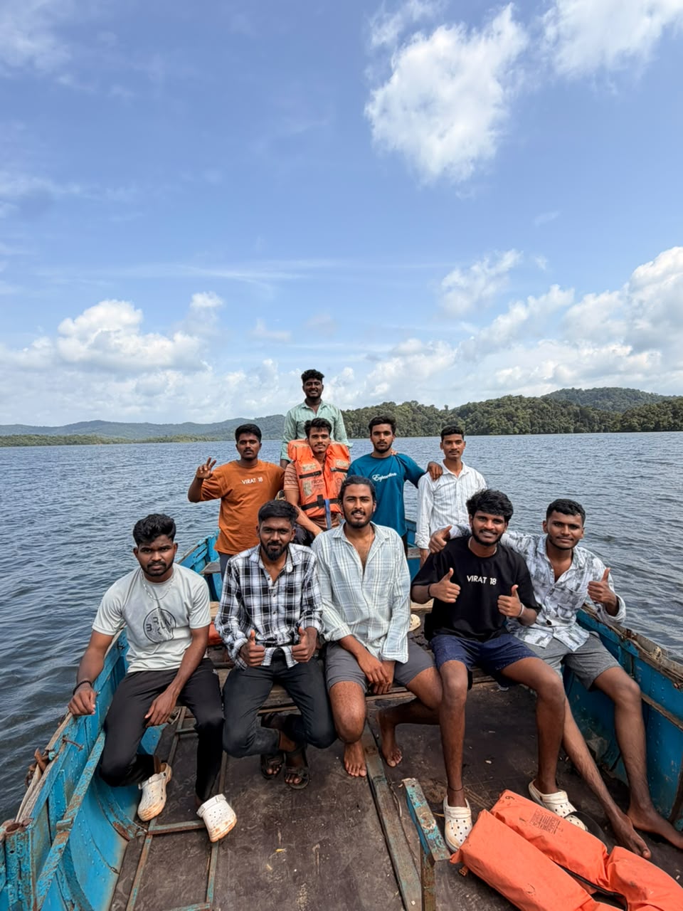 Travelers on a boat ride near Jog Falls