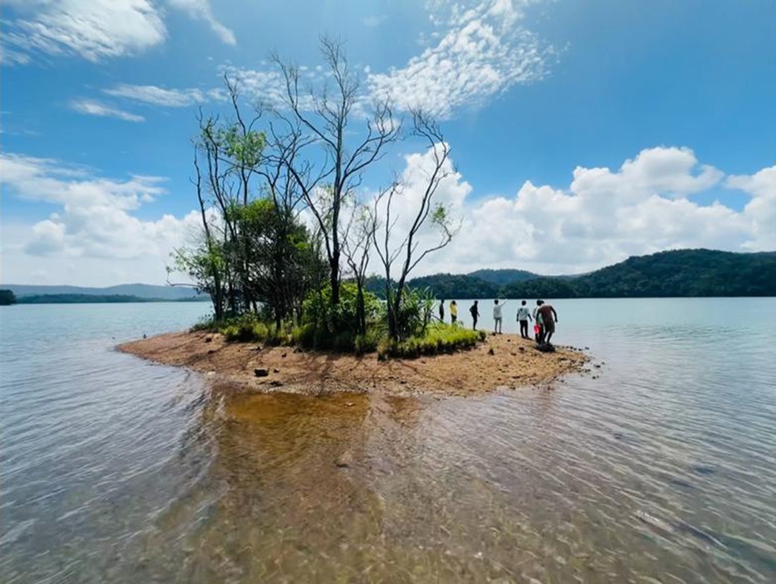 Travelers exploring a lake island on a day trip