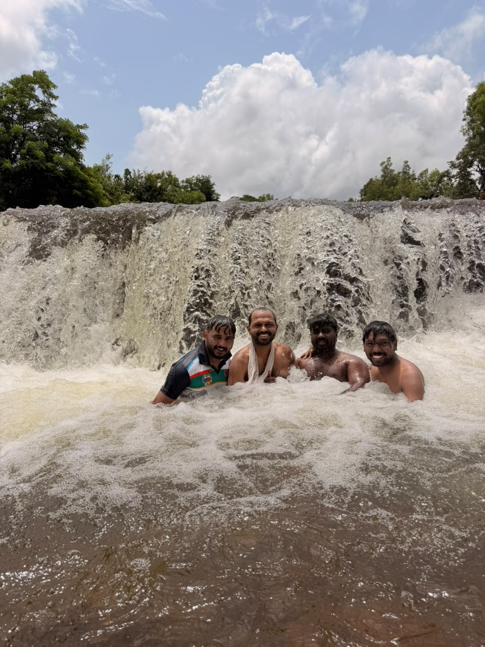 Smaller waterfall along a scenic route near Jog Falls